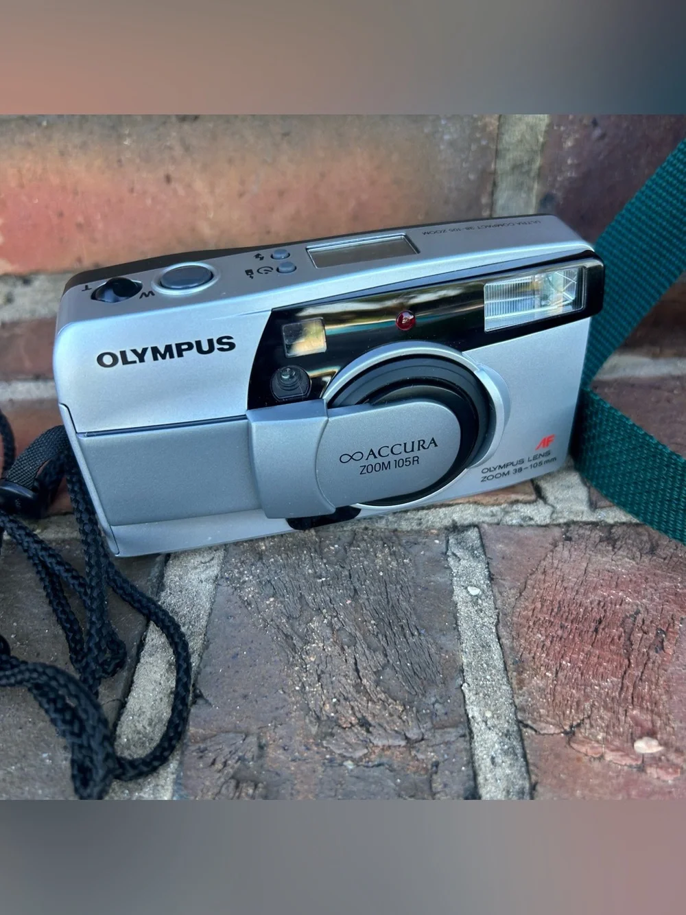 Olympus Accura Zoom 105R 35mm point-and-shoot film camera. With case